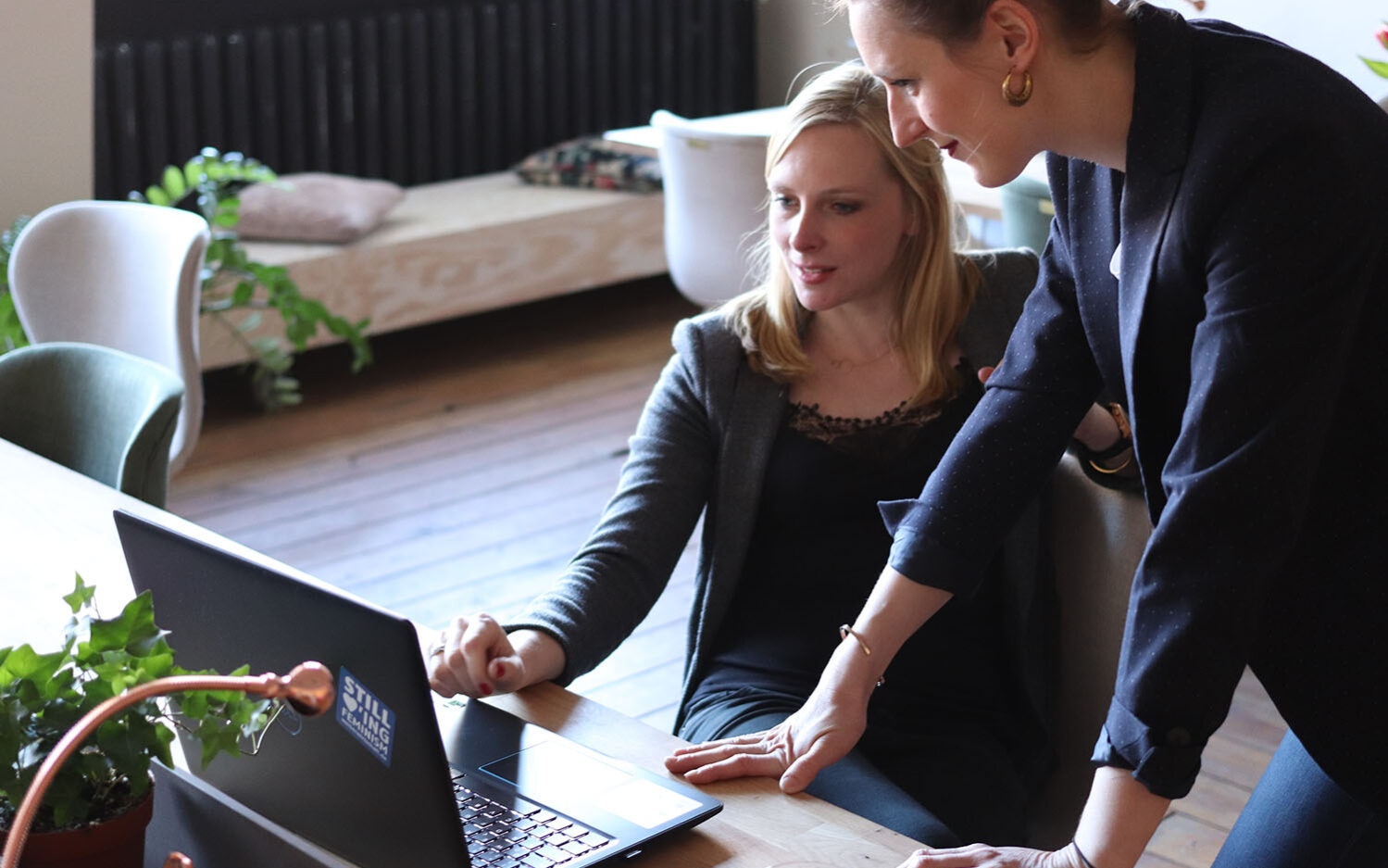 Photo-Credit-CoWomen-Unsplash Photo by CoWomen on Unsplash. Two women working together.