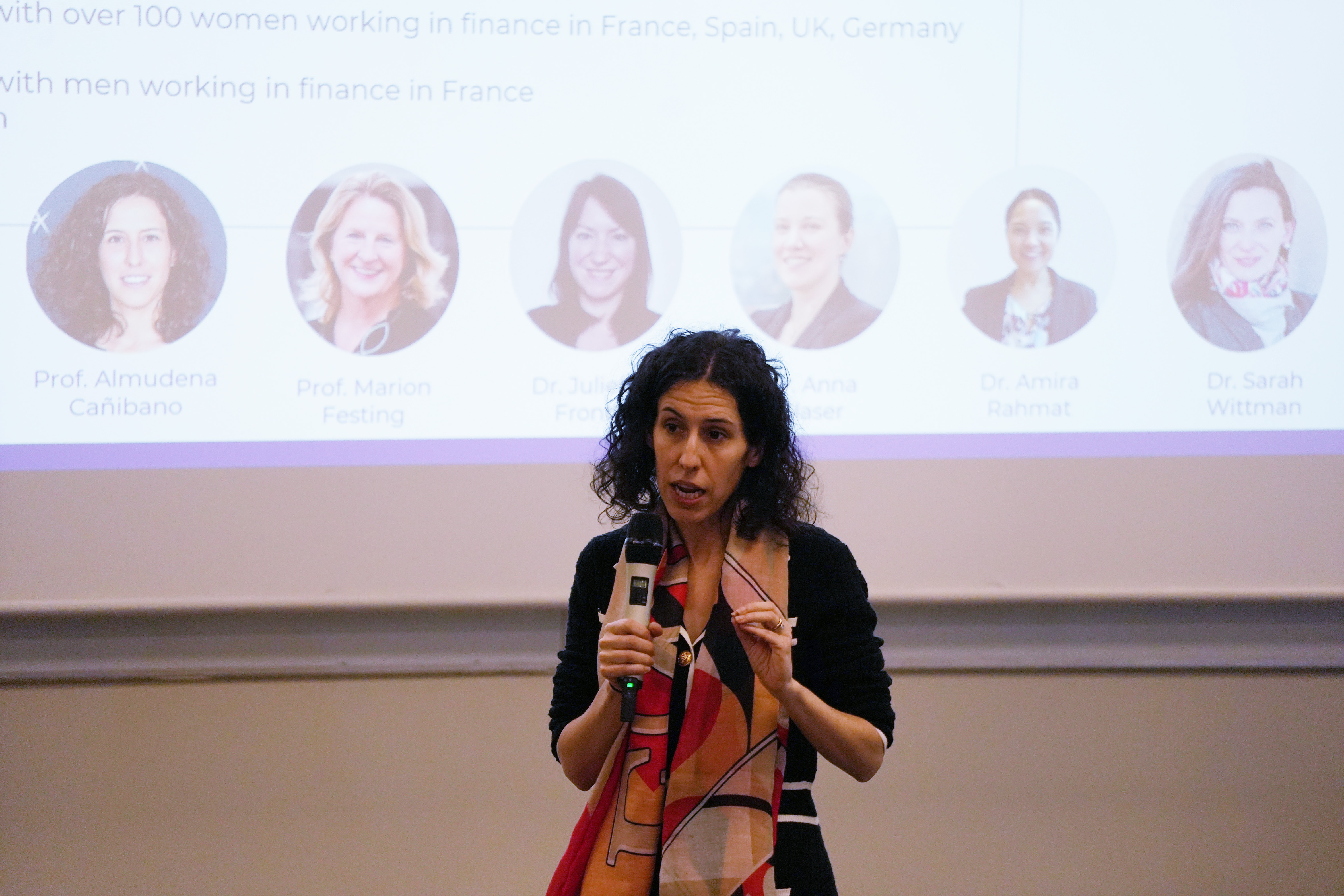 Photo of Professor Almudena presenting the chair