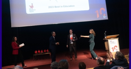ESCP staff accepting an award on a stage